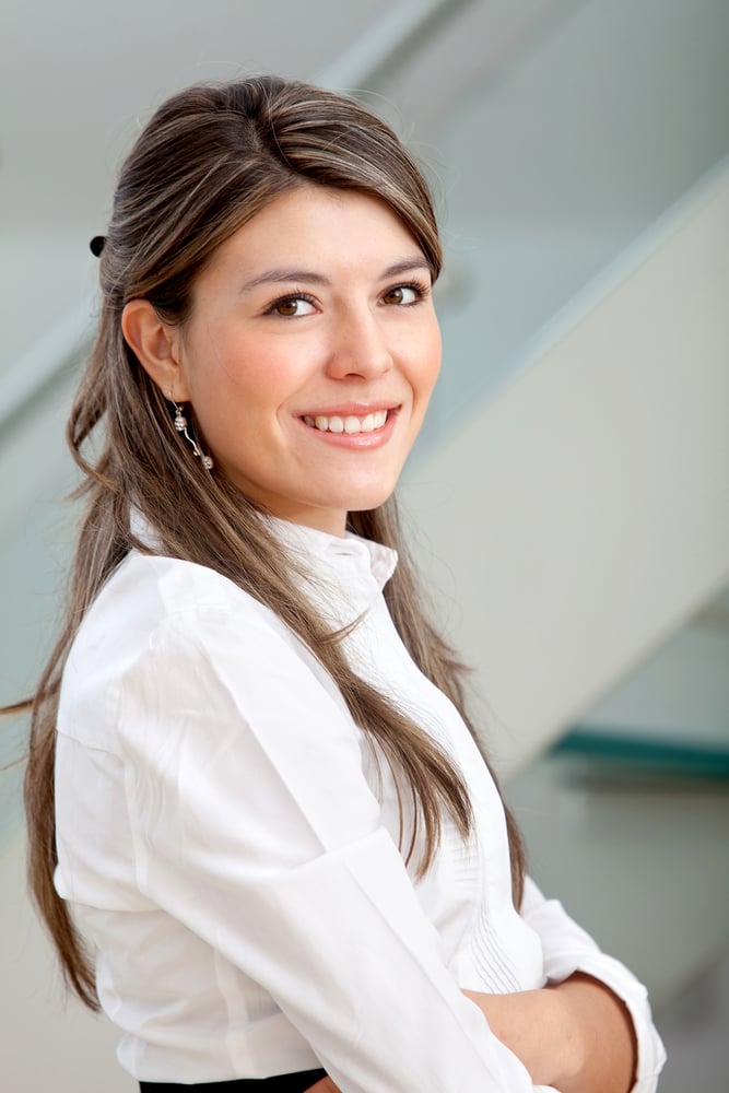 Beautiful business woman smiling at the office